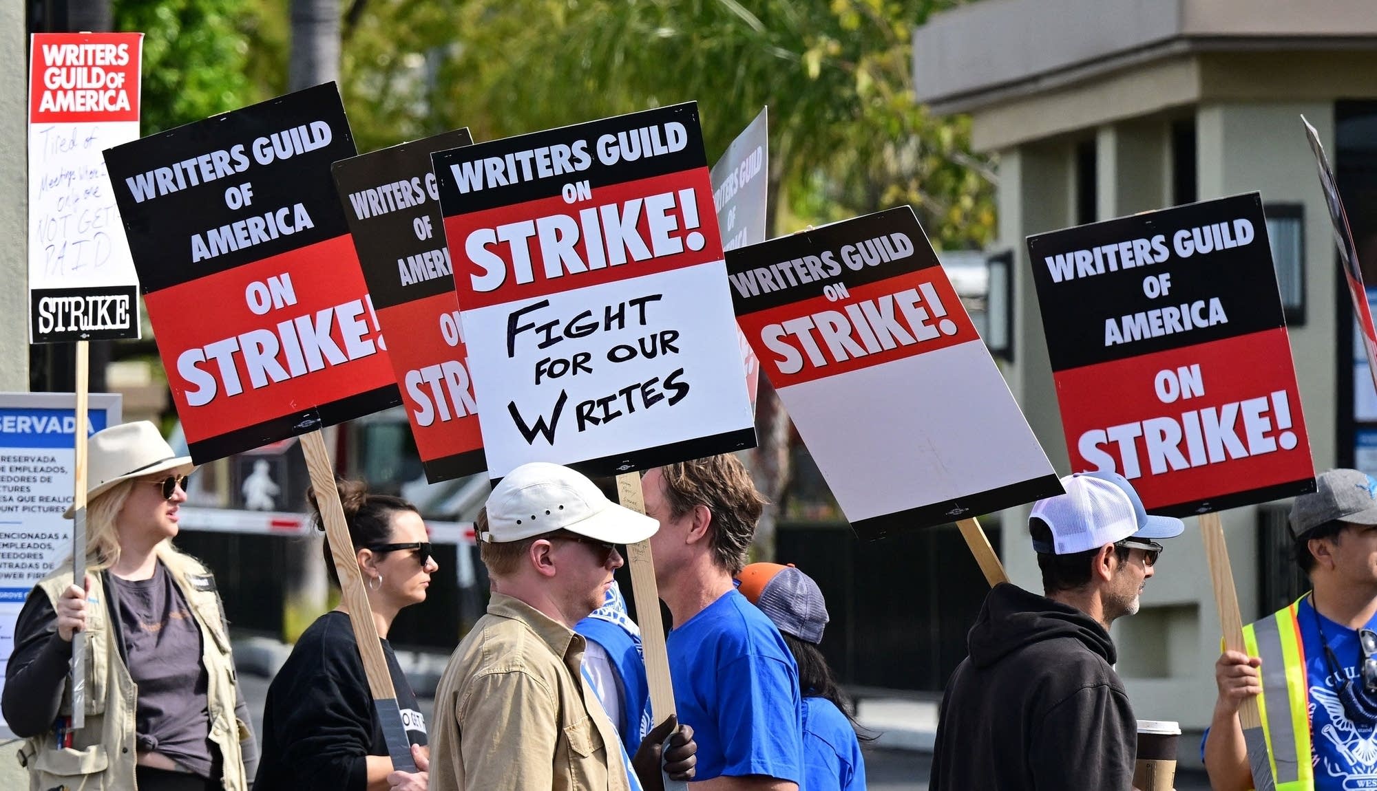 How much less are screenwriters getting paid compared to what they used to?