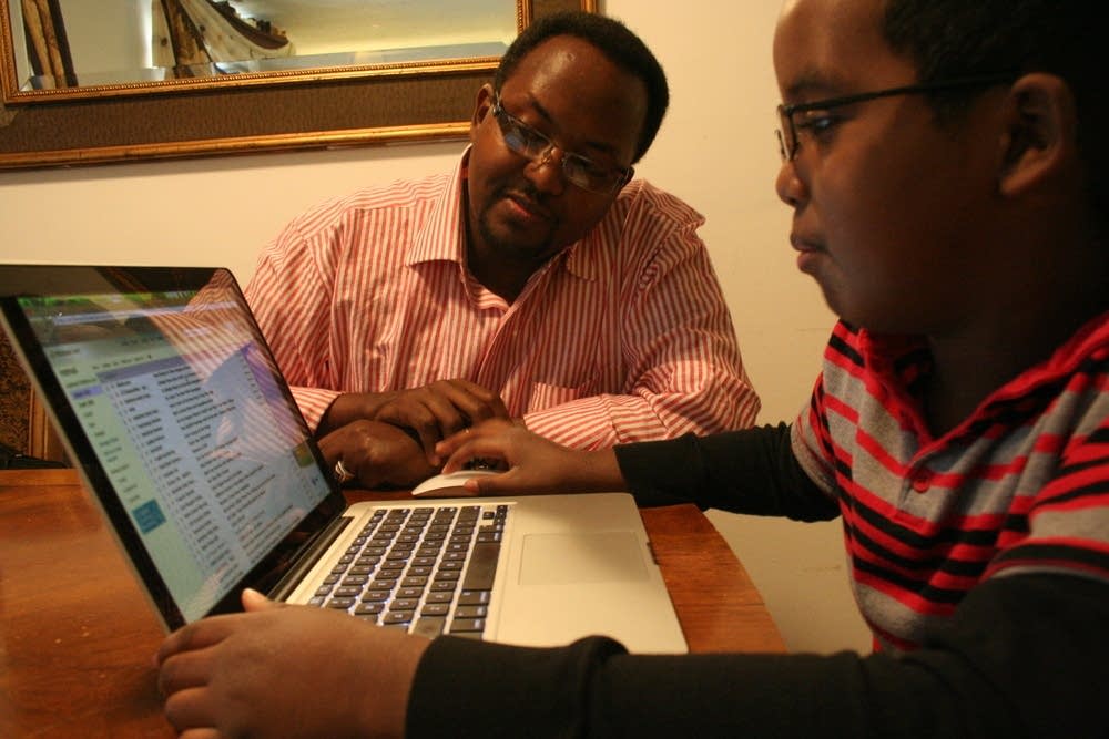 Mohamed Aden and son