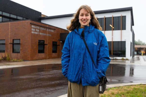 A person poses for a photo