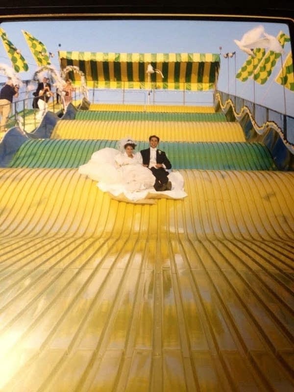 Two people on a slide