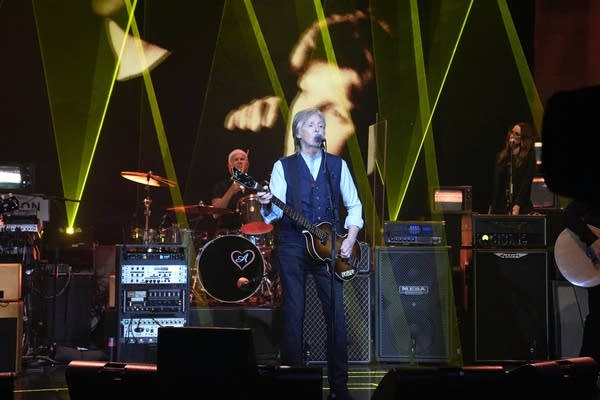 A band performing on a television soundstage