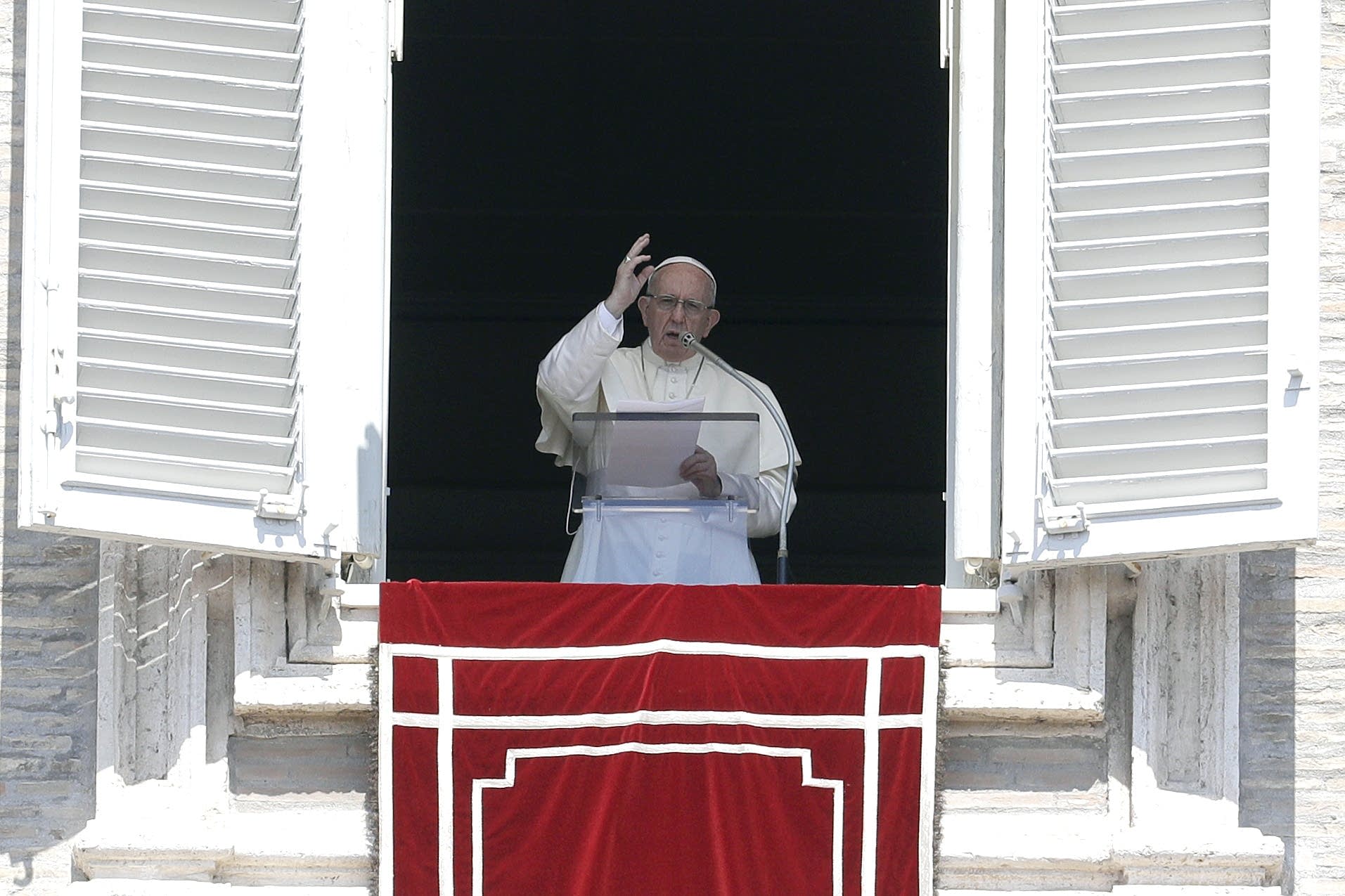 Pope Francis delivers a blessing.