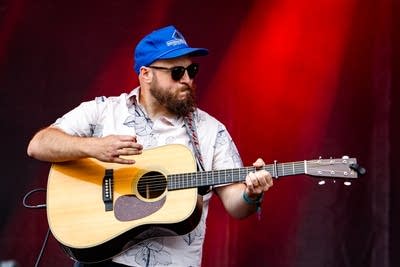 Maygen & the Birdwatcher performing on stage