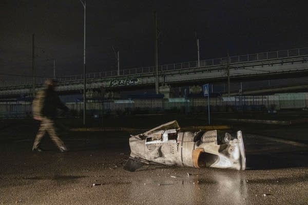 The remains of a Russian missile lies on the ground