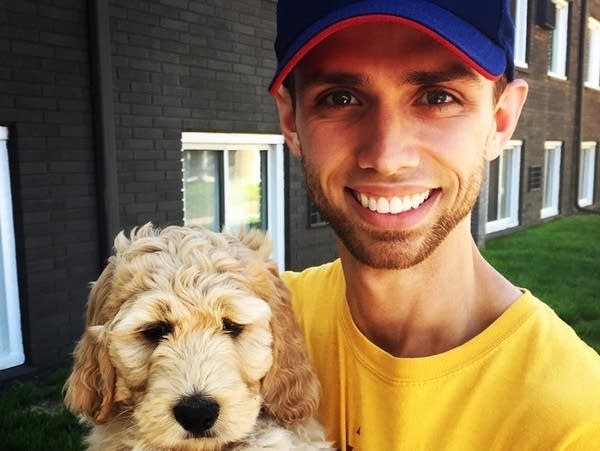 Connor McCarthy and his puppy, Bentley, a Goldendoodle.