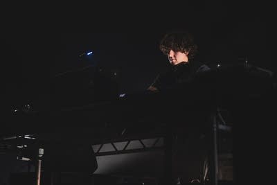jamie xx djing on stage