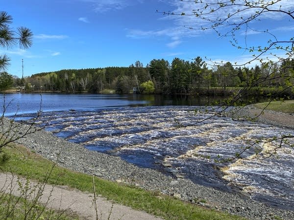 A scene of water moving down and over rocks.