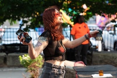 person enjoying live music outdoors