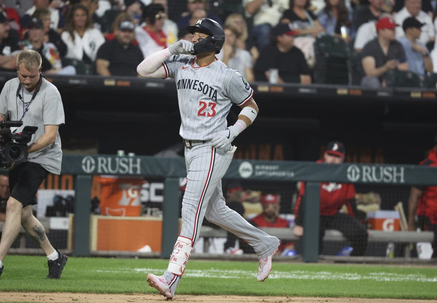 Lewis hits grand slam as Twins beat White Sox 9-7 to snap 3-game