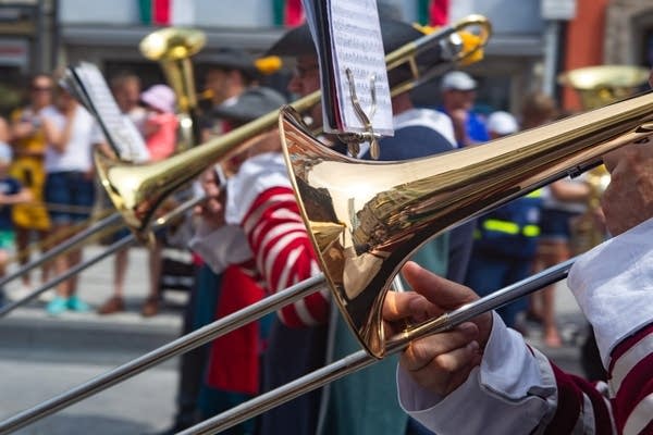 Poster The trombone is very popular in marching bands and parades.