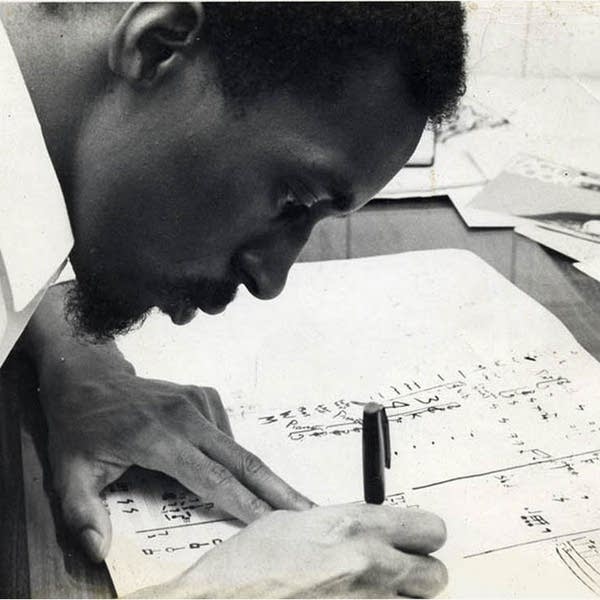 Julius Eastman working on a score