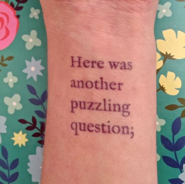 A temporary tattoo of 'Alice in Wonderland'