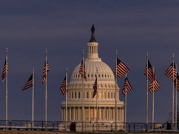 The U.S. Capitol is seen as the sun sets