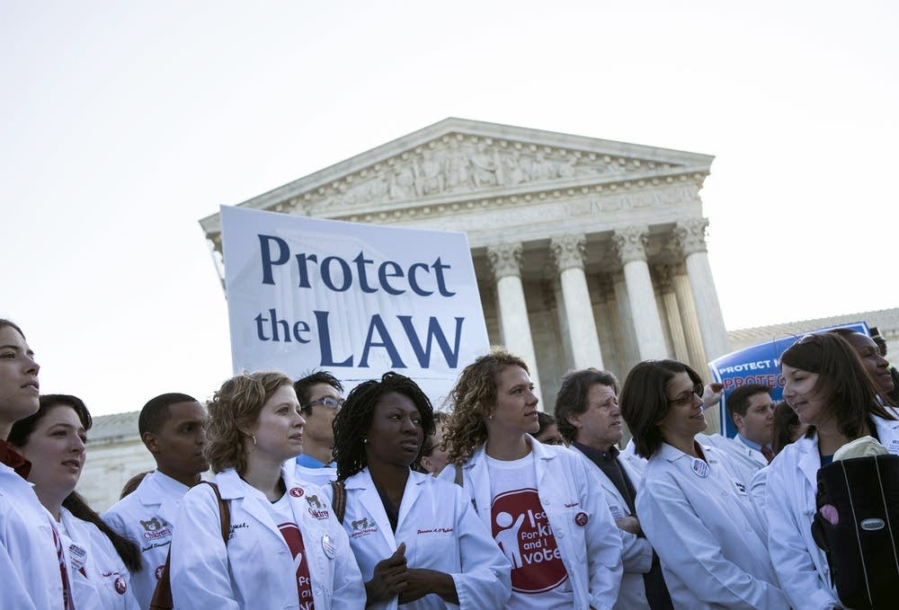 Doctors and medical professionals rally