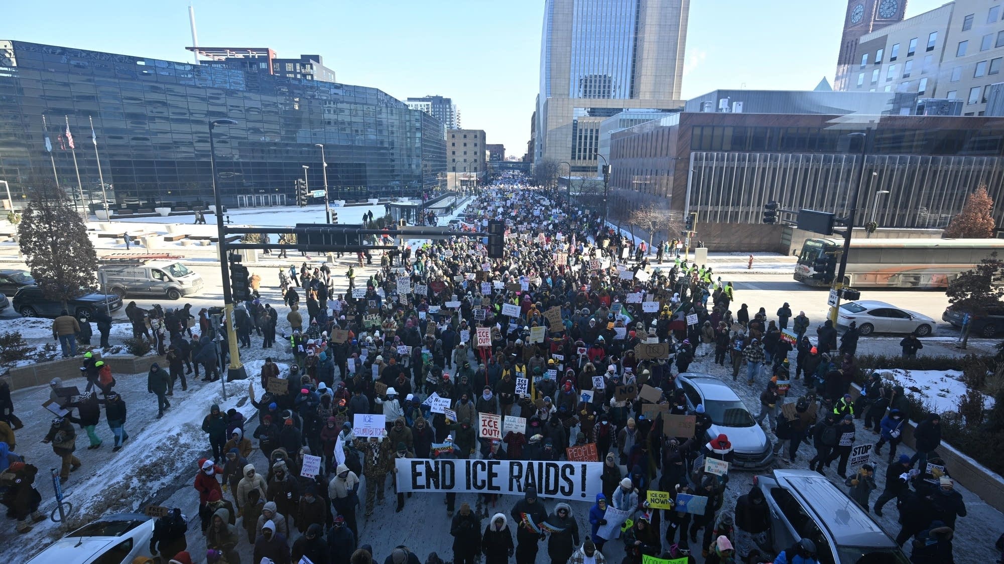 Thousands march in Minneapolis to demand ICE leave Minnesota | MPR News