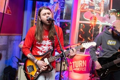 Man singing into microphone