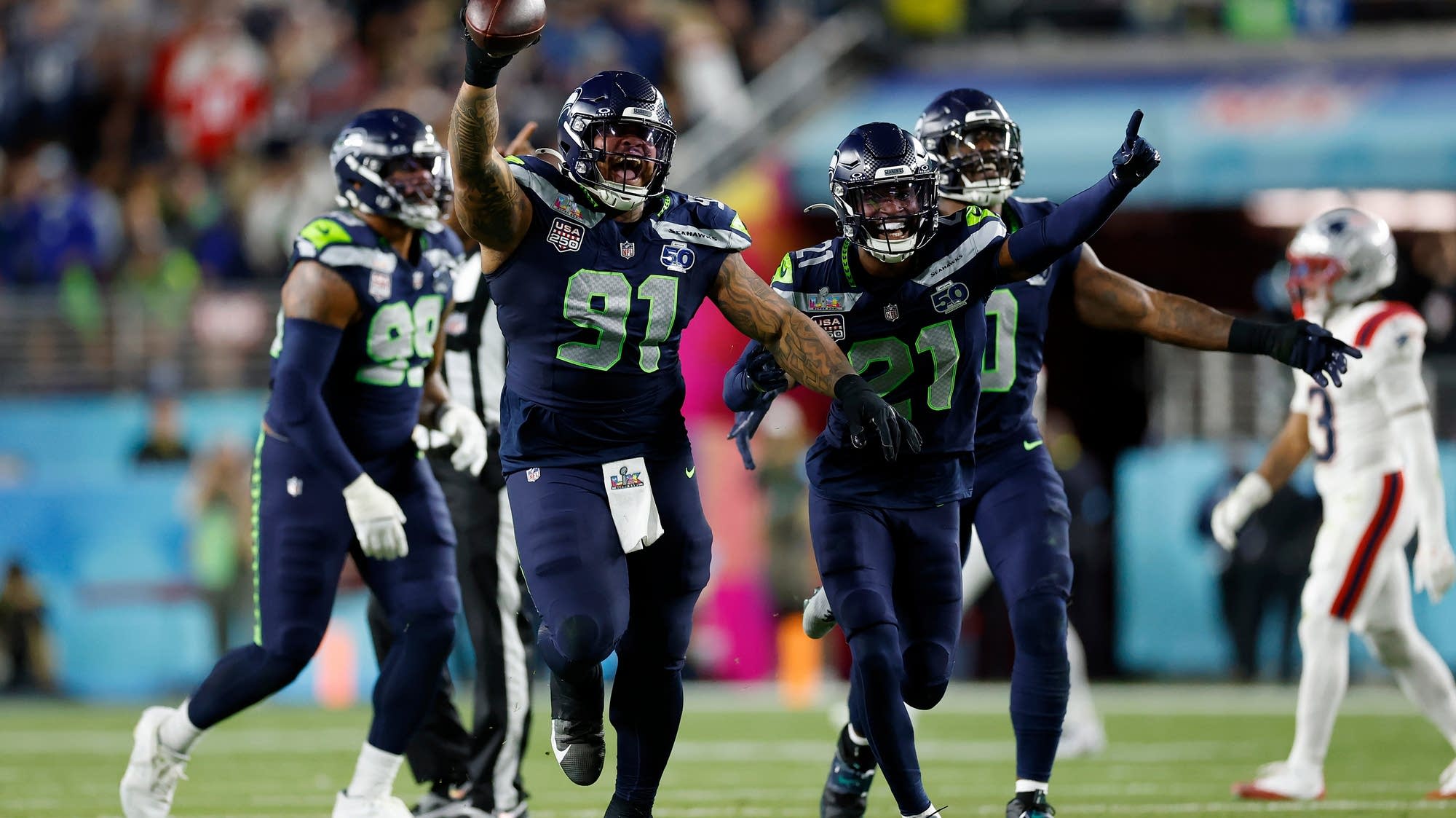 Seahawks ride their 'Dark Side' defense to a Super Bowl title, pounding the Patriots 29-13