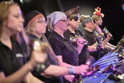 A bell ensemble performing onstage