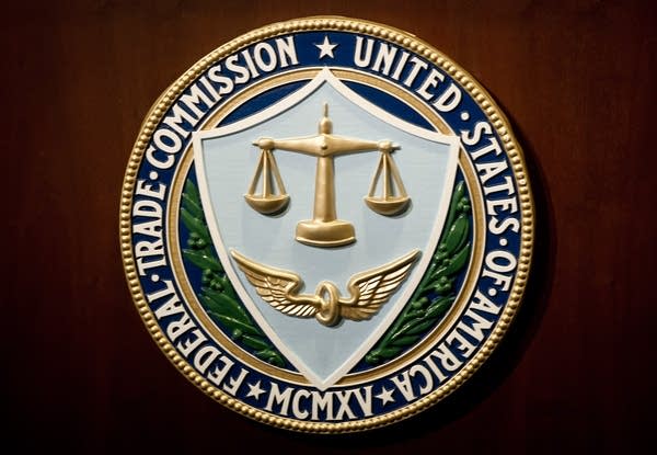 The US Federal Trade Commission seal is seen during a press conference in Washington, DC on January 3, 2013.