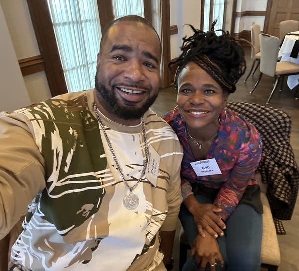 two people smiling for selfie photo