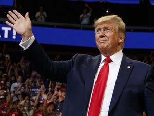 President Trump arrives to speak at his reelection kickoff rally.