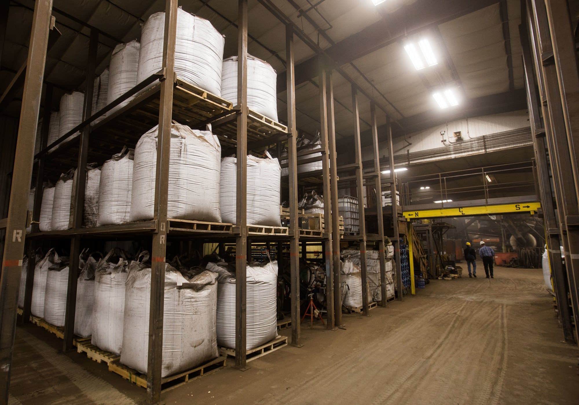 One ton bags of granular peat await delivery to customers.