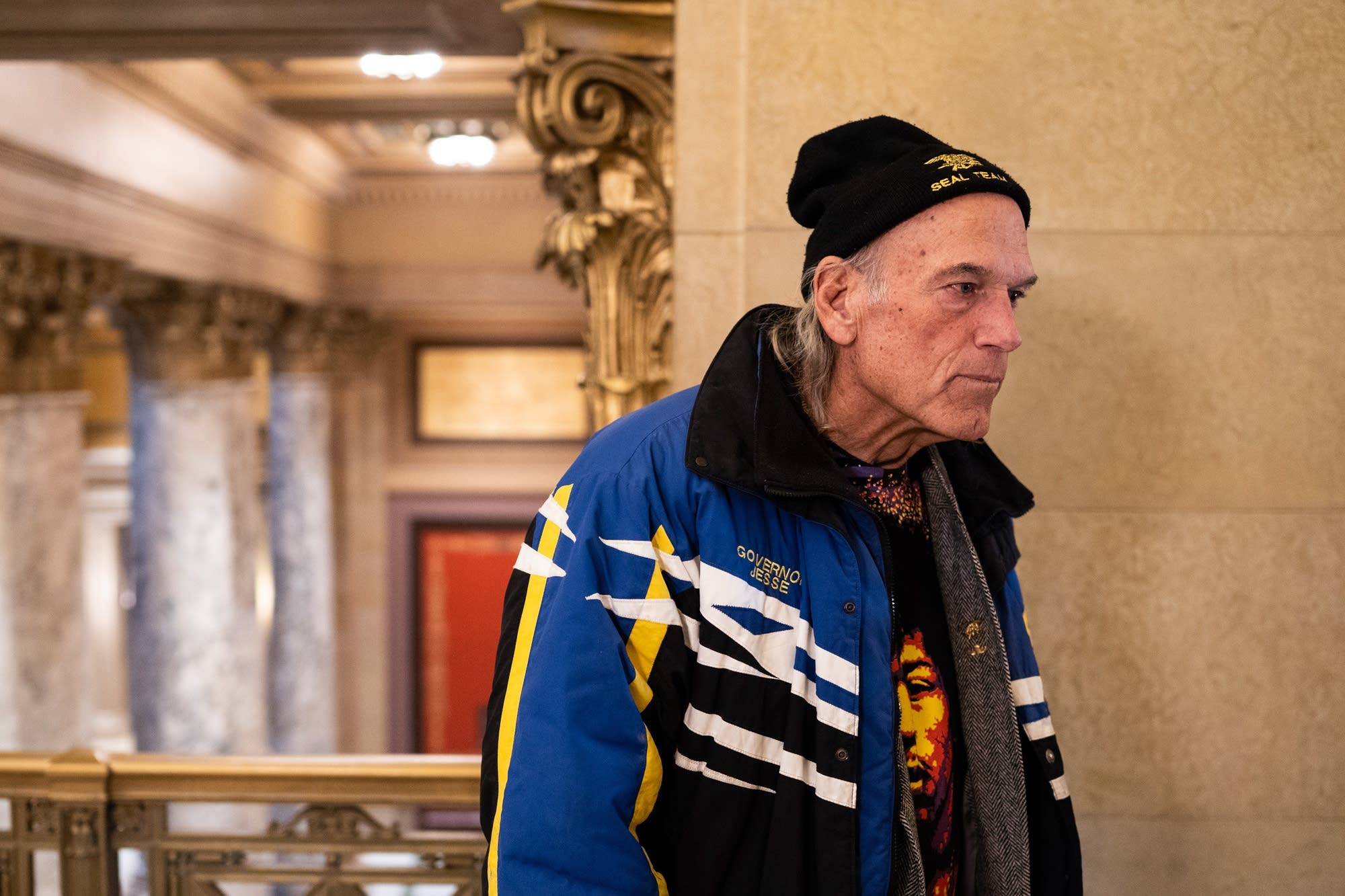 Former Minnesota Gov. Jesse Ventura speaks to reporters.