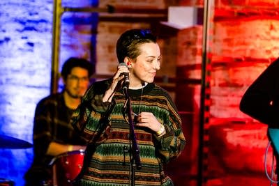 A singer performs onstage