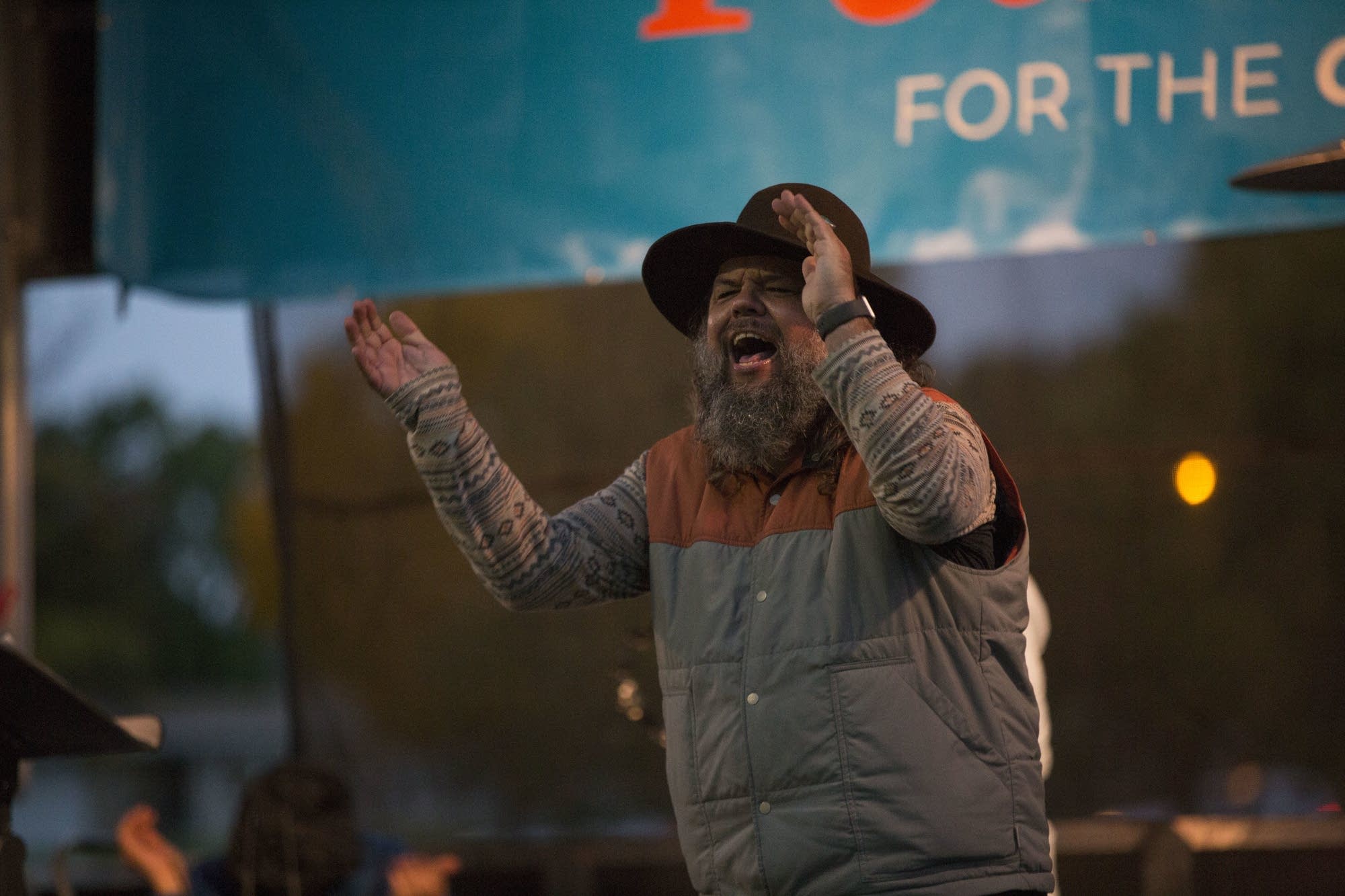 Vince Anderson pumps up the crowd at the Vote Common Good rally