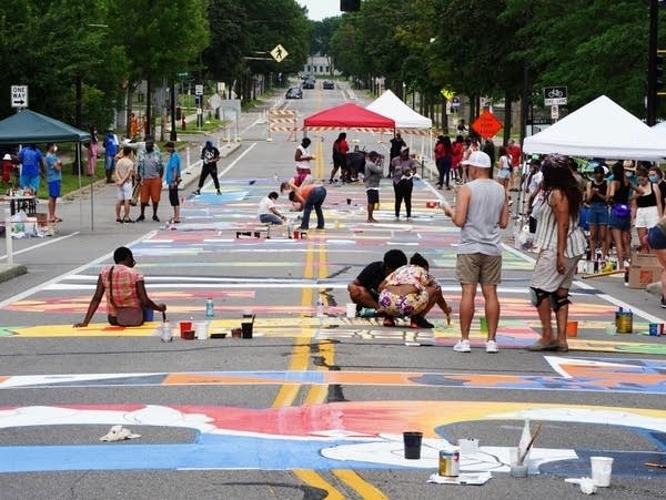 Photos: Artists paint Black Lives Matter mural on Minneapolis street