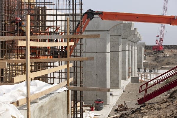 A view of a large structure under construction.