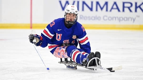 An athlete skates on the ice.