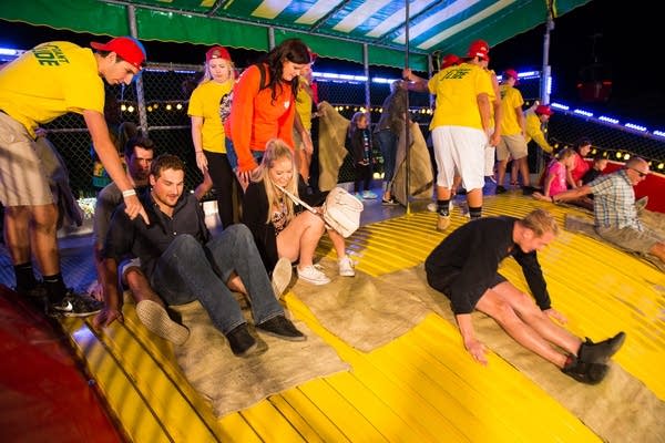 Riders push off the Giant Slide. 