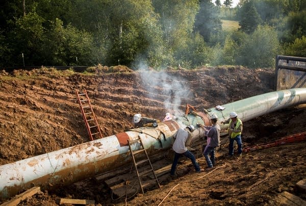 Contractors work on an oil pipeline in Wisconsin.