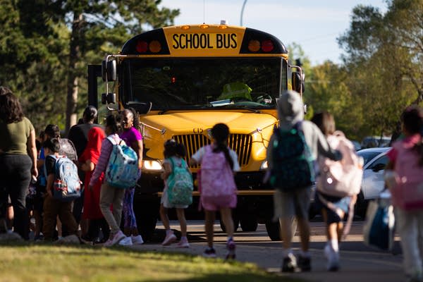 Students arrive at a school