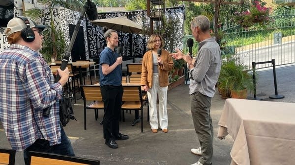 "Marketplace" host Kai Ryssdal speaks with Stephanie Ellingwood (left) and Janie Trinh (right), the owners of Untamed Spirits in Los Angeles. 