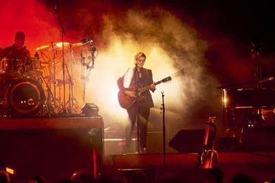 Brandi Carlile and band performing on stage