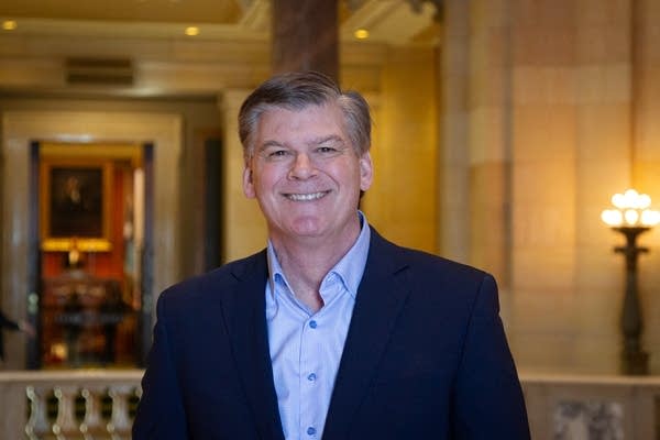 A man stands in the capitol rotunda.
