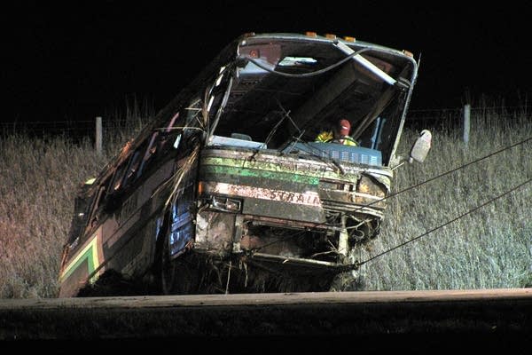 Damaged bus near Austin, Minn.