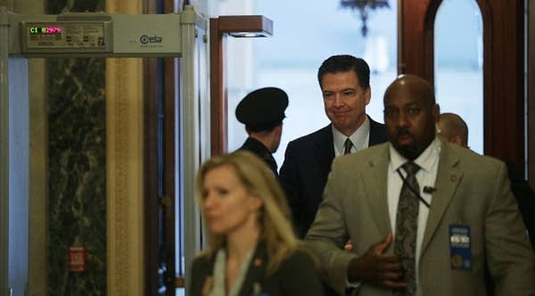 Director James Comey (2nd R) arrives at the U.S. Capitol for a classified briefing on Russia for all members of the House of Representatives January 13, 2017 on Capitol Hill in Washington, DC. The internal Office of the Inspector General at the Justice Department announced yesterday that it is conducting a review on the handling of FBI and DOJ's investigation into the Hillary Clinton private e-mail server case. 
