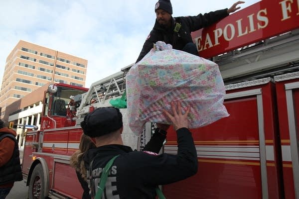 For burn patients, Minneapolis firefighters deliver gifts, and understanding