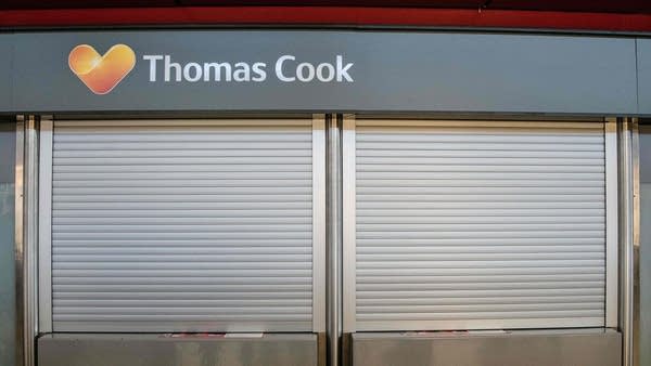 The service desk of British tour operator Thomas Cook is closed at Tegel airport in Berlin on Sept. 23, 2019. 