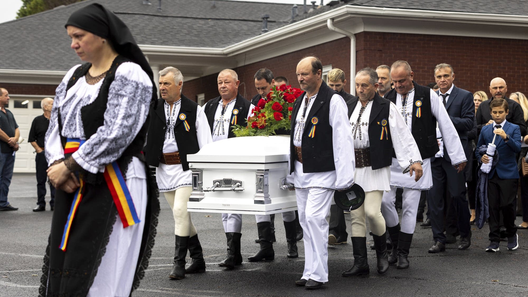 Funerals held for teen boy and math teacher killed in high