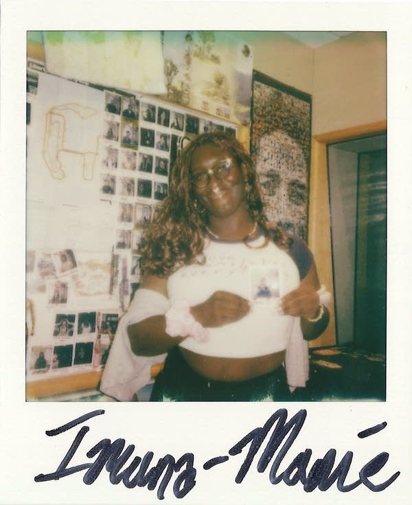 Imana-Mamé Bioh posing in a polaroid photo in the carbon sound studio