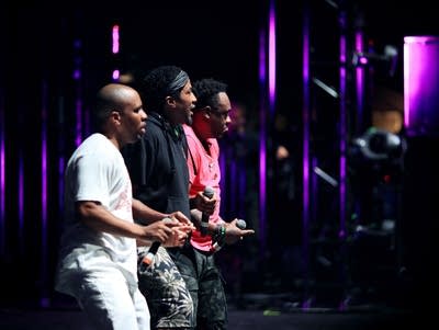 A Tribe Called Quest performing on stage