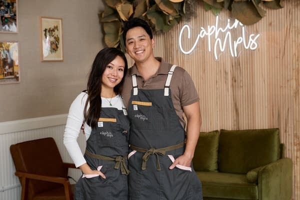 Two people pose for a photo