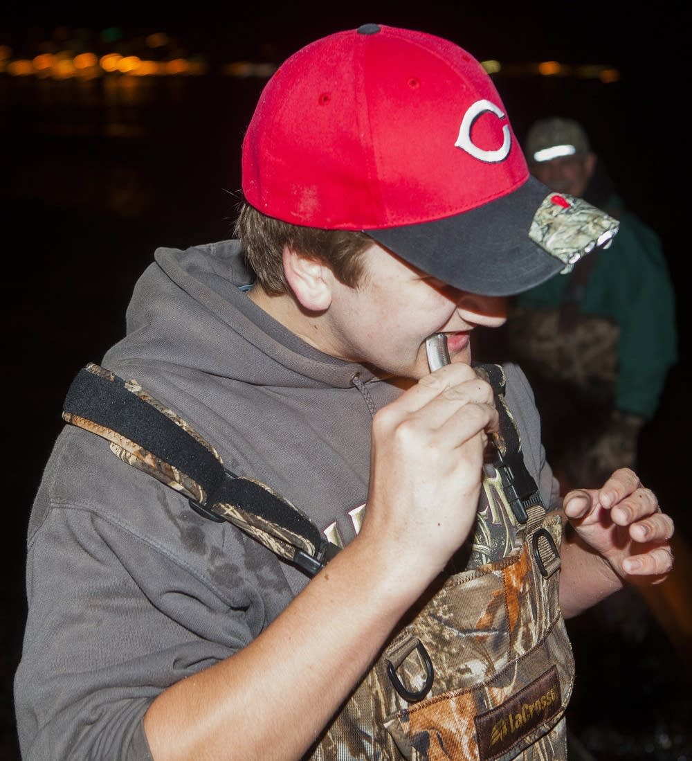Andrew Franks bites the head off a smelt