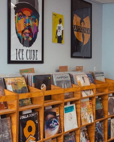 Racks of records and posters on display in a record shop