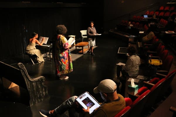 People rehearsing for a musical