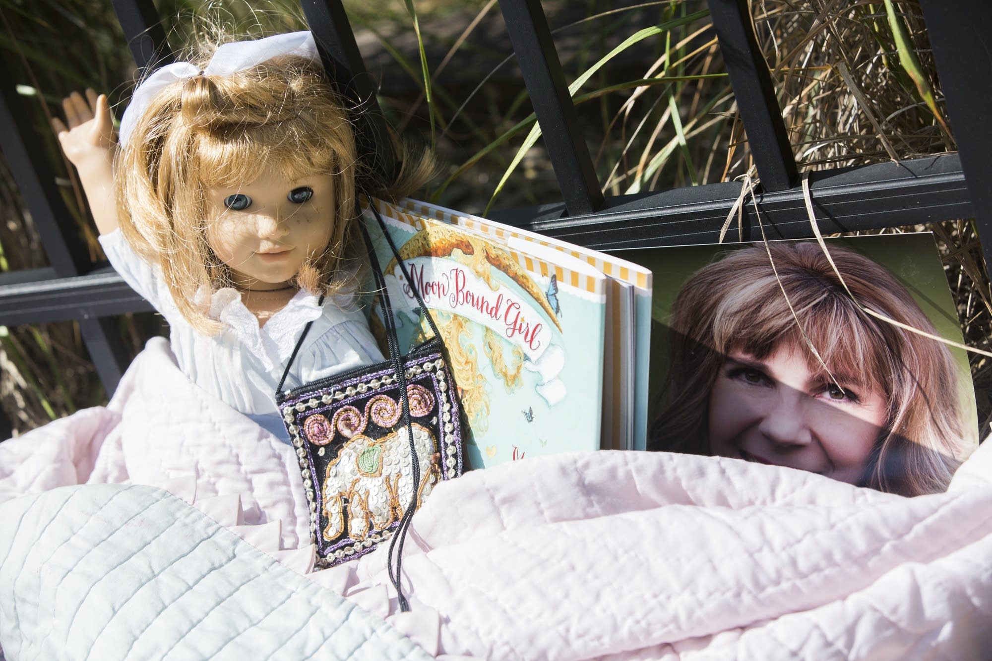 Mourners left dolls, books, flowers and photographs.